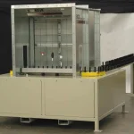 Binks Spindle Master II compact chain-on-edge conveyor with spray booth